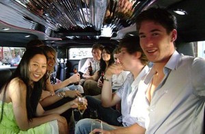 A group of friends having a good time in an American Luxury Limo