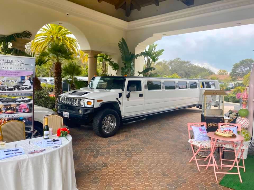 A white Hummer limo