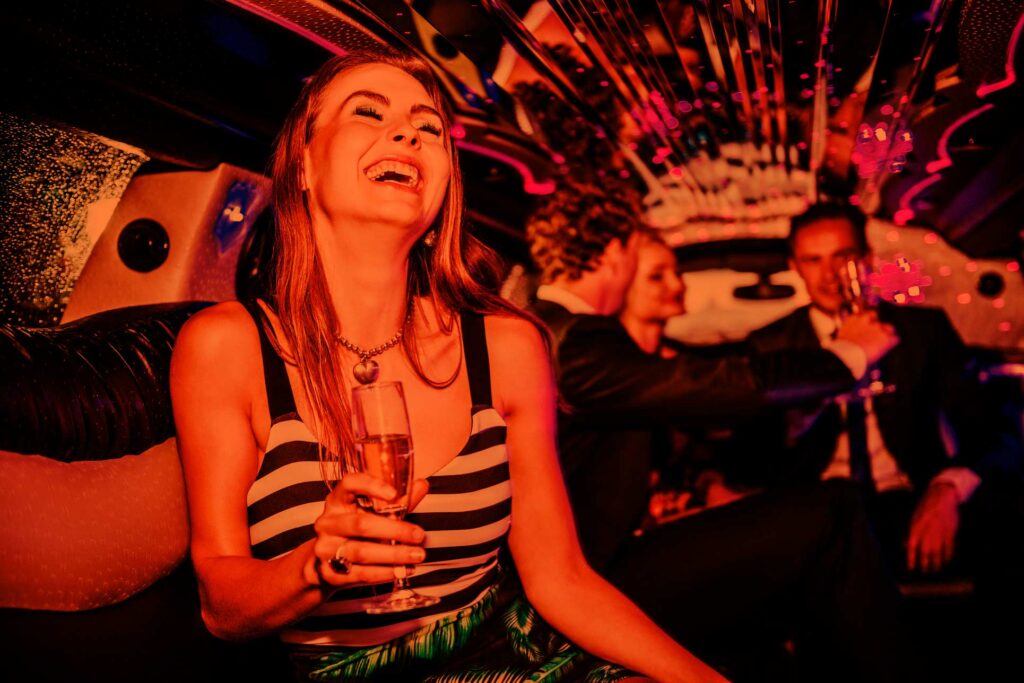Image illustrating partying inside of a limo.